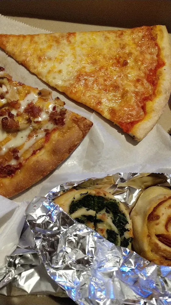 Chicken Bacon Ranch Slice Regular Slice and a Spinach Roll and Pepperoni Roll